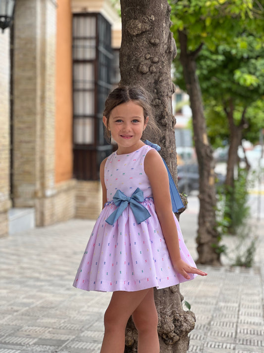 Pink dress with blue bow